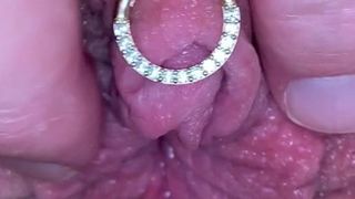 Milf plays with huge pierced clit