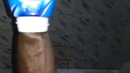 Desi boy inserting BBC into bottle