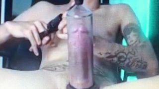 Latino vac tube pumping his huge thick cock in the tube