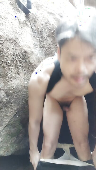 at the waterfall in broad daylight.