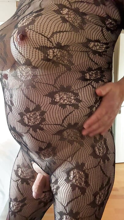 Sexy crossdresser wearing and wanking in lace sheer bodystocking.
