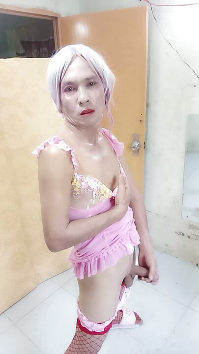 Oanh Le transgender wearing sexy and pornographic clothes standing and screaming is extremely happy