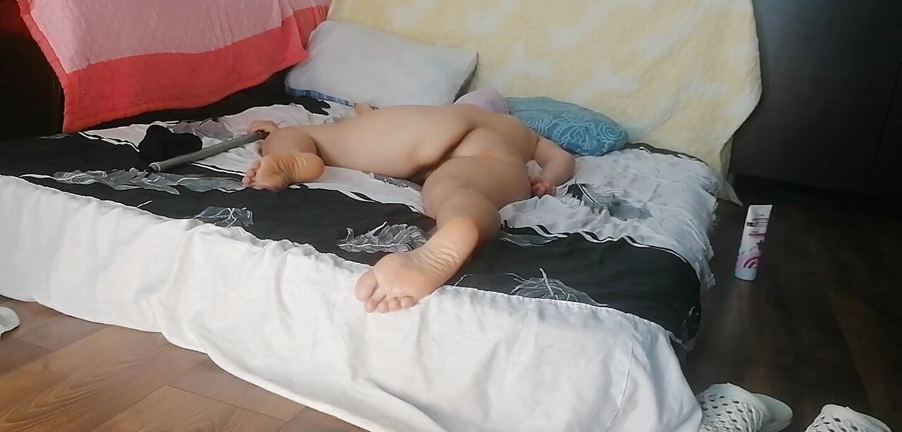 Sensual massage of a steamy couple with oil on the body. Foreplay in the bedroom with an amateur couple.
