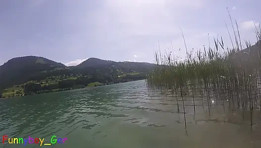 Jerking off underwater and pumping cum into the water in a stunning mountain lake.