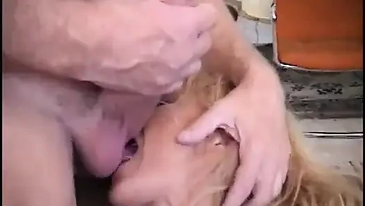 The babe is sucking on the older man's cock one morning