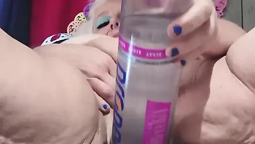 Big Bottle Plugged Clit Cunt