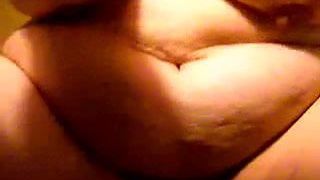 Horny granny shows tits and masturbates