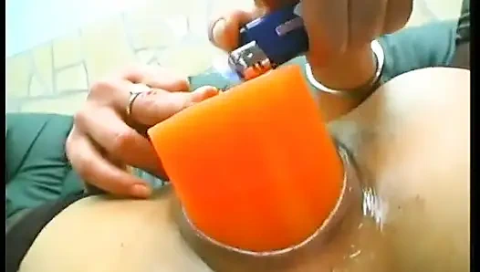 Brunette mature slut wearing stockings while drilling her holes with food and huge candle