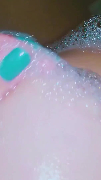 Captivating moment from "Dorm Mate Dips Dinky Tits in Bathtub"
