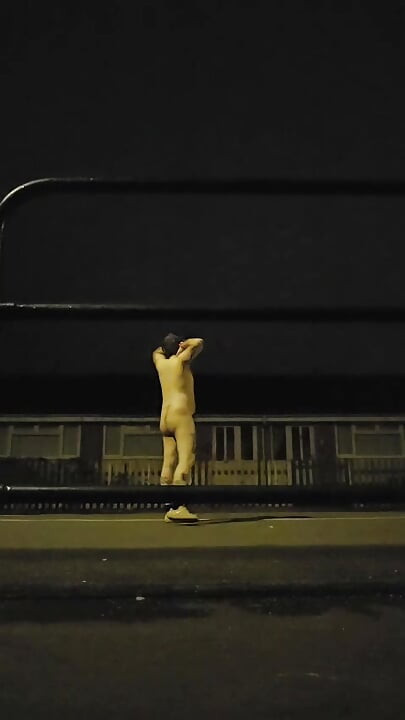 Walking naked through park and street