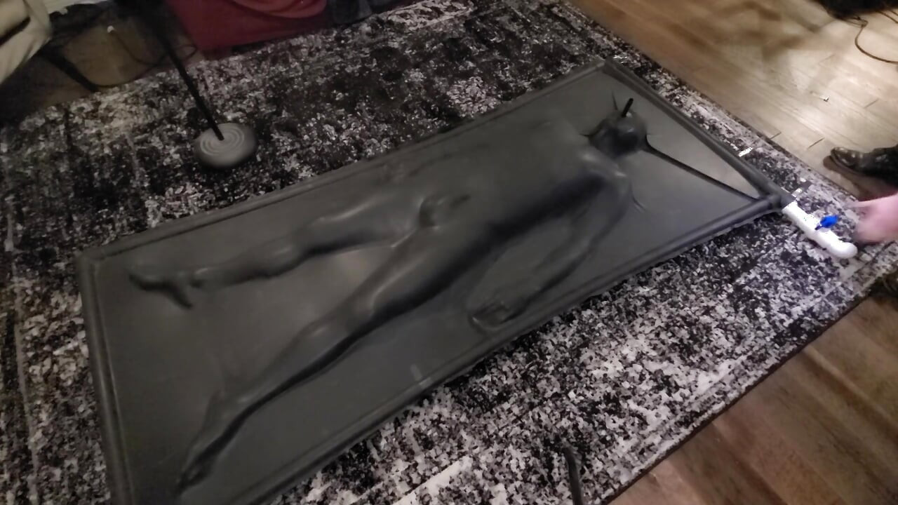 Cute twink tormented in latex vacbed