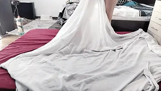 Sexy brunette doing naked chores around the house.