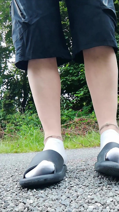 In Slippers and White Socks in Nature