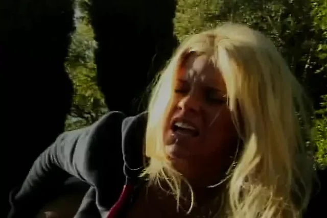 A pretty blonde babe eats cuk after a hot outdoor fuck