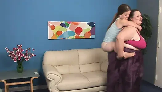 BBW chick in lesbian action with a midget