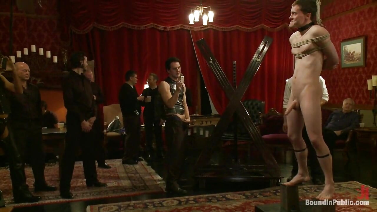 Partygoers Beat and Skull Fuck a Big Dick Stud in Bondage.