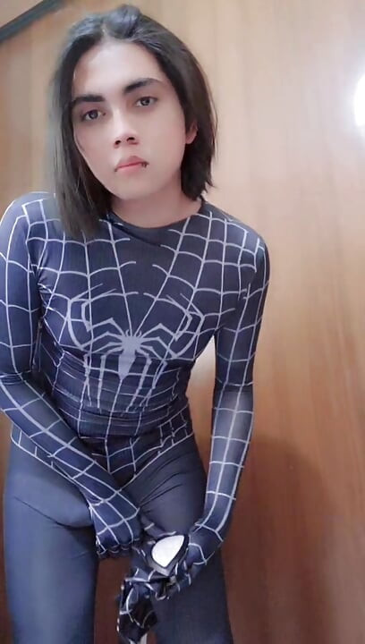Spider-Man strips naked and shows his ass.