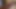 Vollbusige schwarze MILF in Dessous wichst auf Schwanz