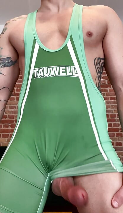 Jock rubs his cock in wrestling singlet and cums hands free