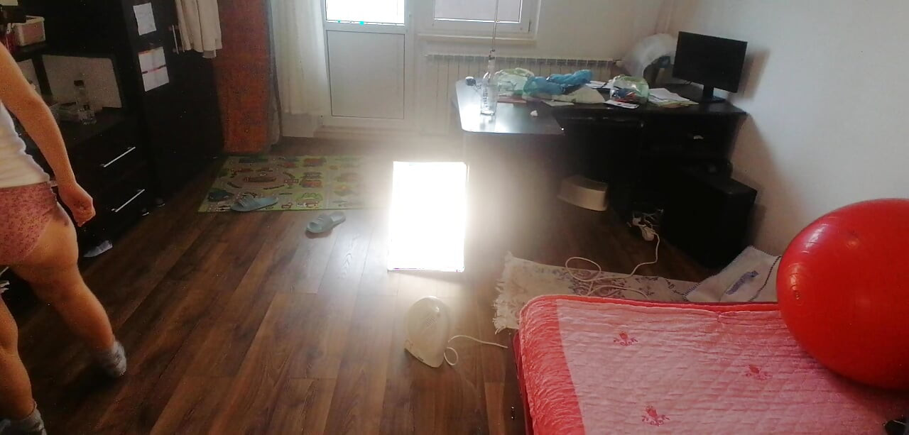 Amateur wife dancing naked at home. Amateur woman has fun trying on clothes and cutting them.