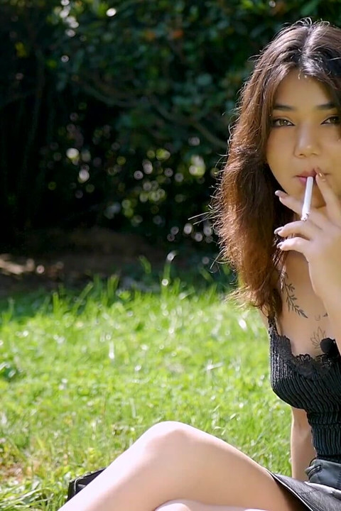 Arina Is Smoking 120mm Cigarettes Outdoors