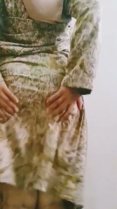 The beauty of a woman when wearing a baju kurung is like a Malay girl. | Clip 1