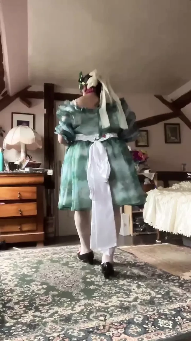 In a baby doll outfit with a diaper for a day
