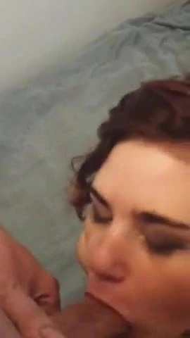 Short haired beauty gives head