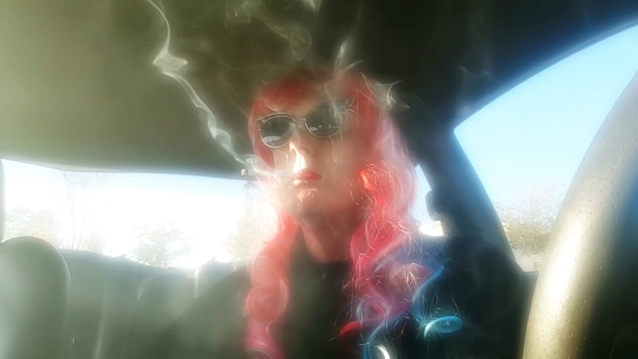 MATURE RED HEAD MRS. ROMAN CAR SMOKING VS 120 MENTHOLS