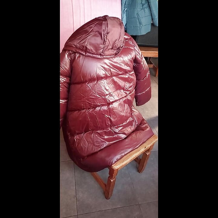 Her cherry red puffercoat lining gets my cum after a long fuck