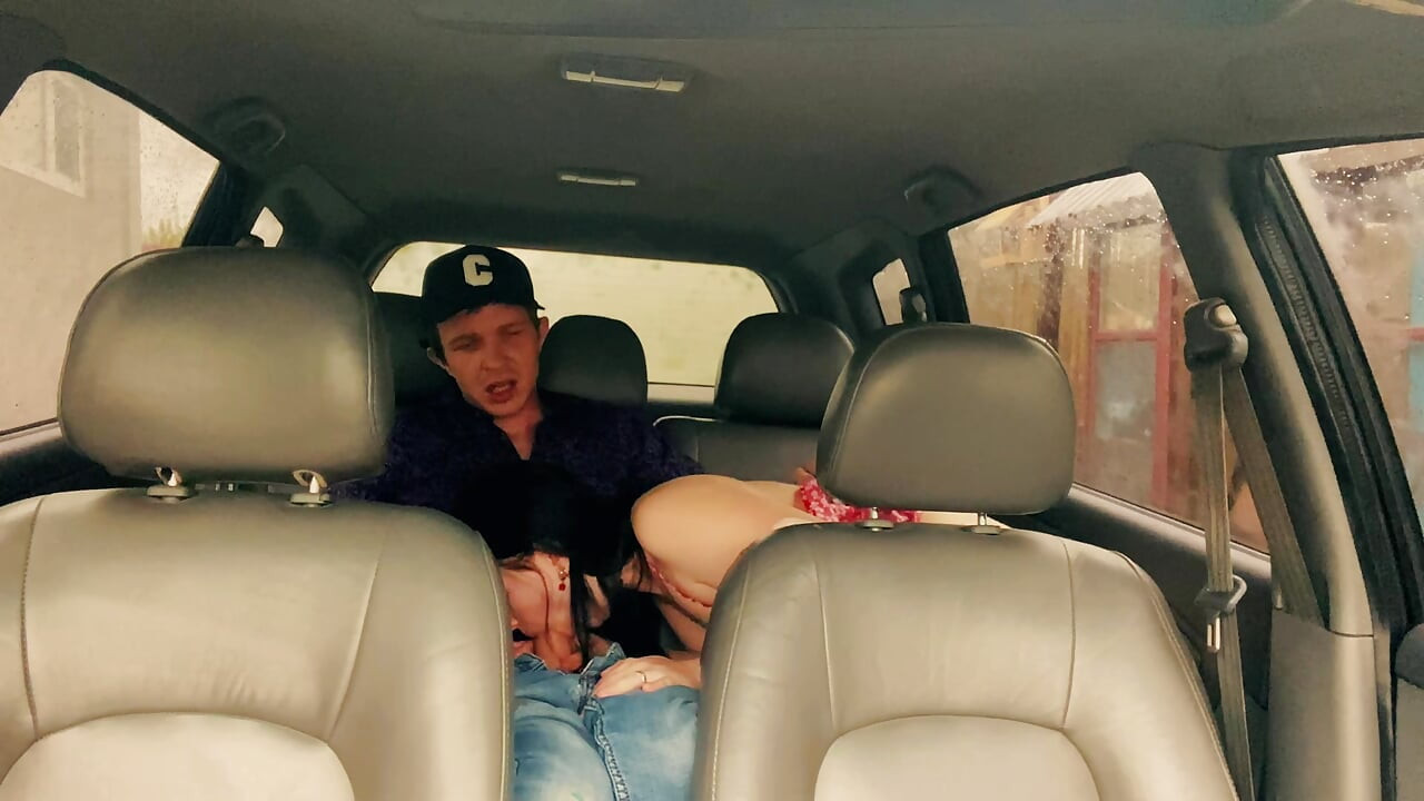 Wife cheating with a taxi driver in the car outside the house