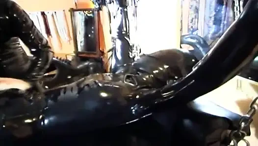 Bdsm with masked girl in latex