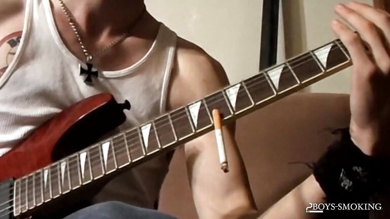 BoysSmoking Axel Smokes Heavy While Rocking Out And Stroking His Dick