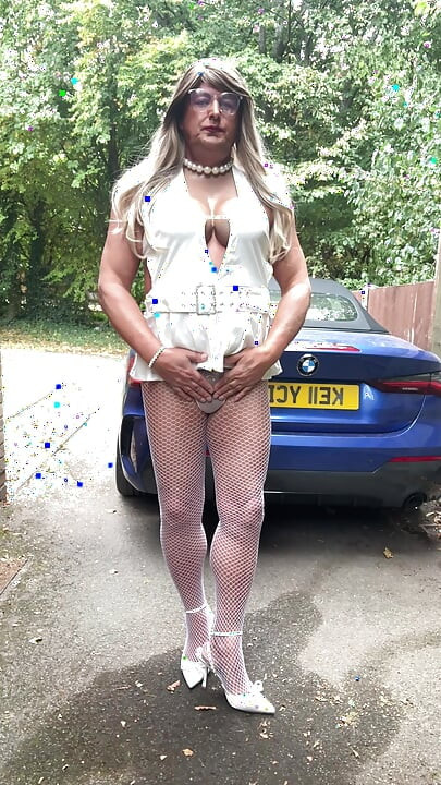 Sexy Crossdresser kellycd2022 in sexy white mini dress and fishnet pantyhose and heels