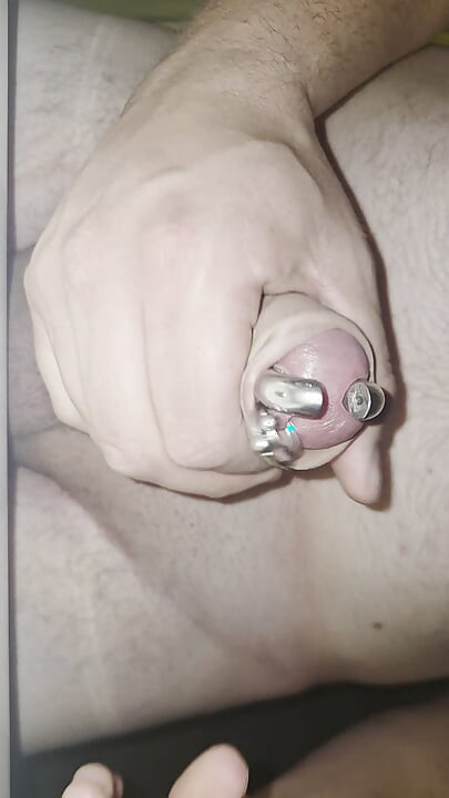 Cum trough piercing hole.