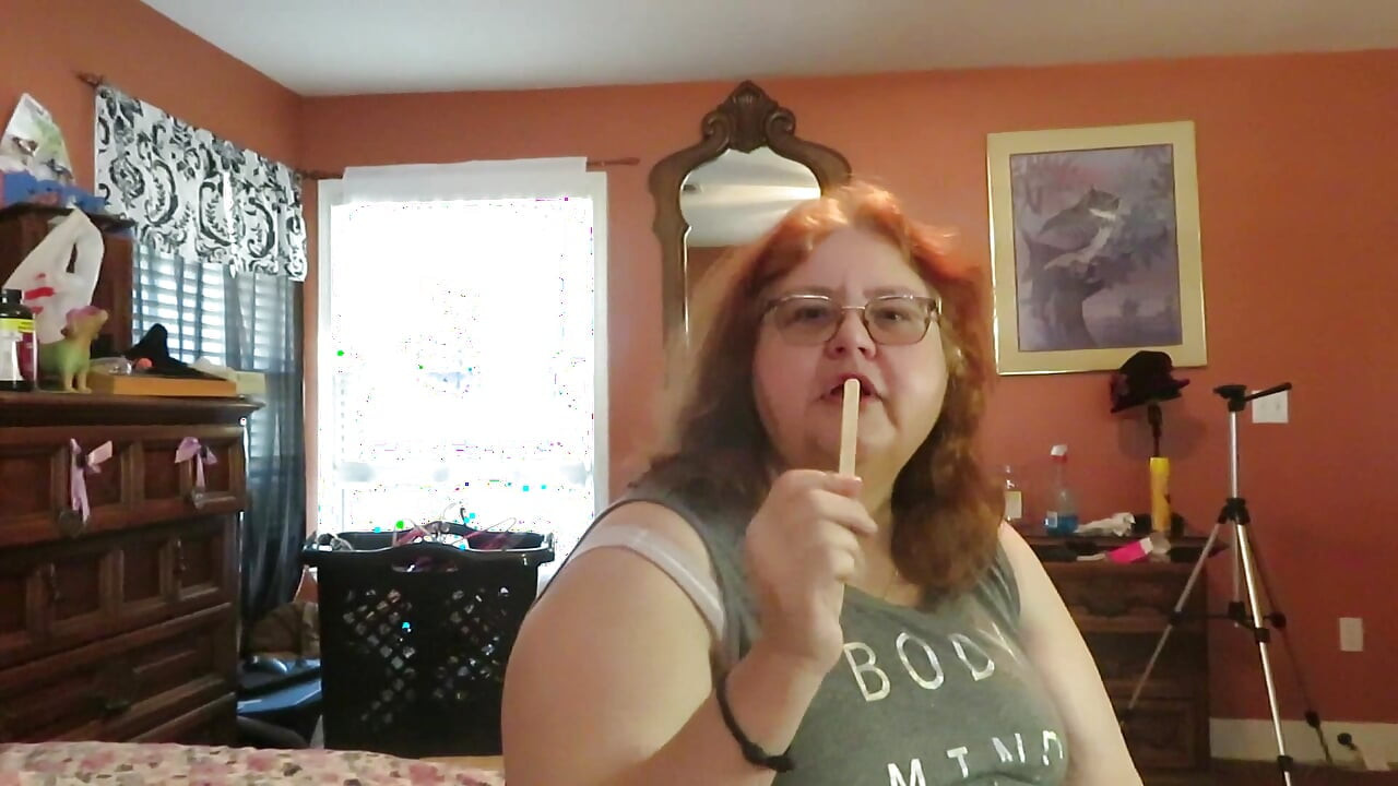 BBW nurse Vicki enjoys eatting a chocolate vanilla ice cream popsiscle
