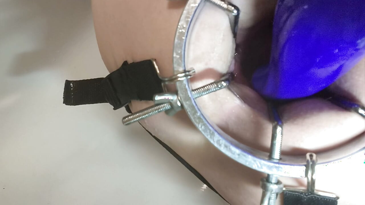, vibrator in anal completely. Anal dilator close-up, sperm on the ass.