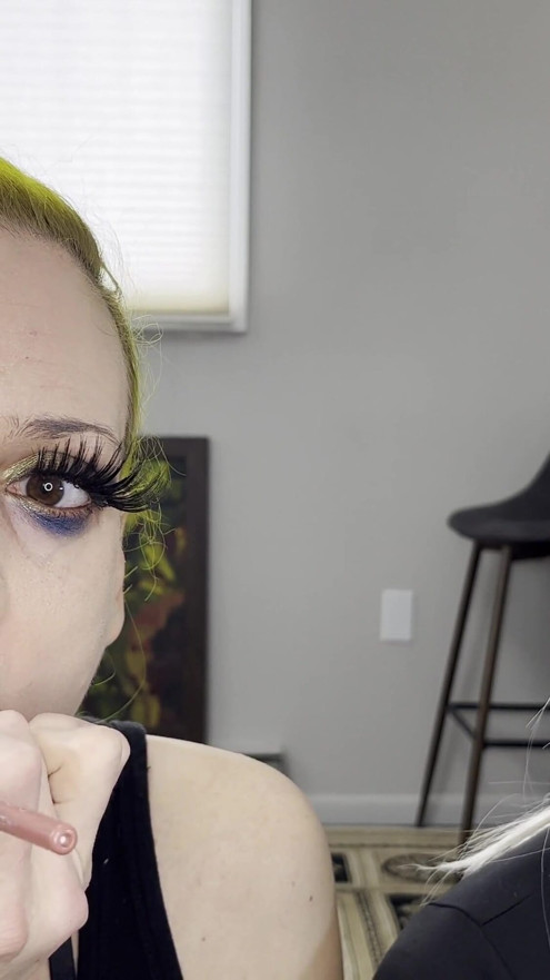 Man and Woman Putting on Lipliner and Lipstick | Clip 1