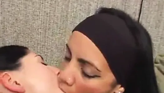 Deep Kissing between mature and young lesbians