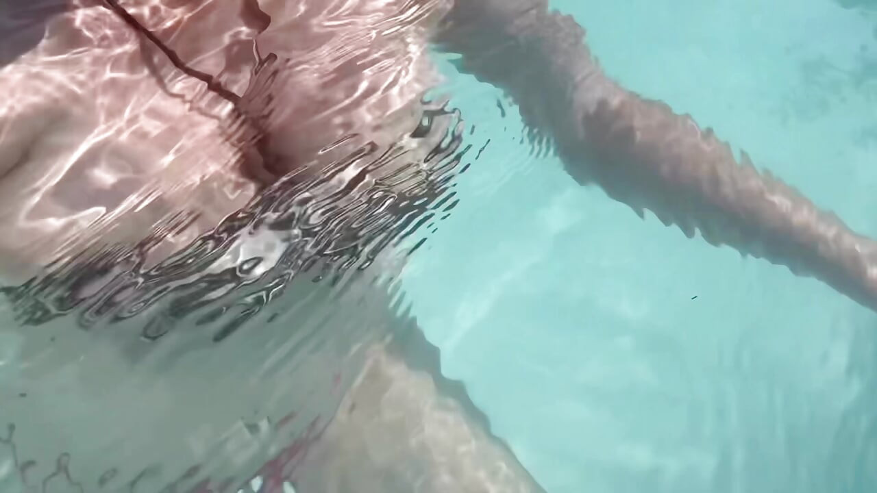 Artemisia Love flashing her juicy big tits underwater for you wearing a sexy bikini