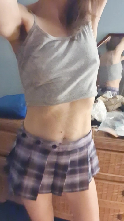 Purple pleated mini skirt , the perfect length to show you my unplugged arse and fourchette piercing.