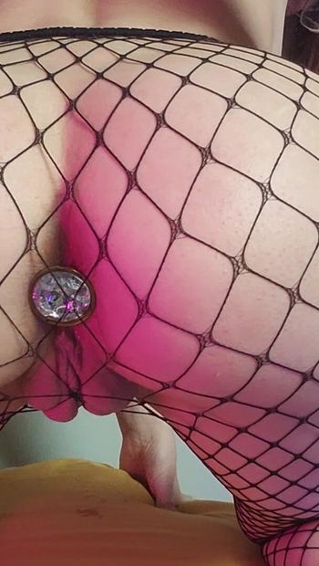 Playing with my buttplug in fishnets