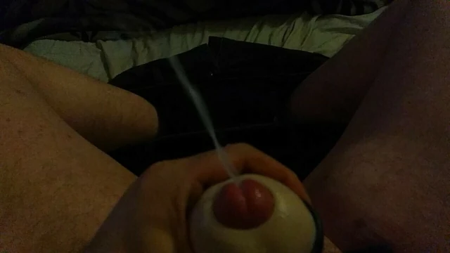 Slow-Motion Closeup of Man Cumming With Open Masturbator