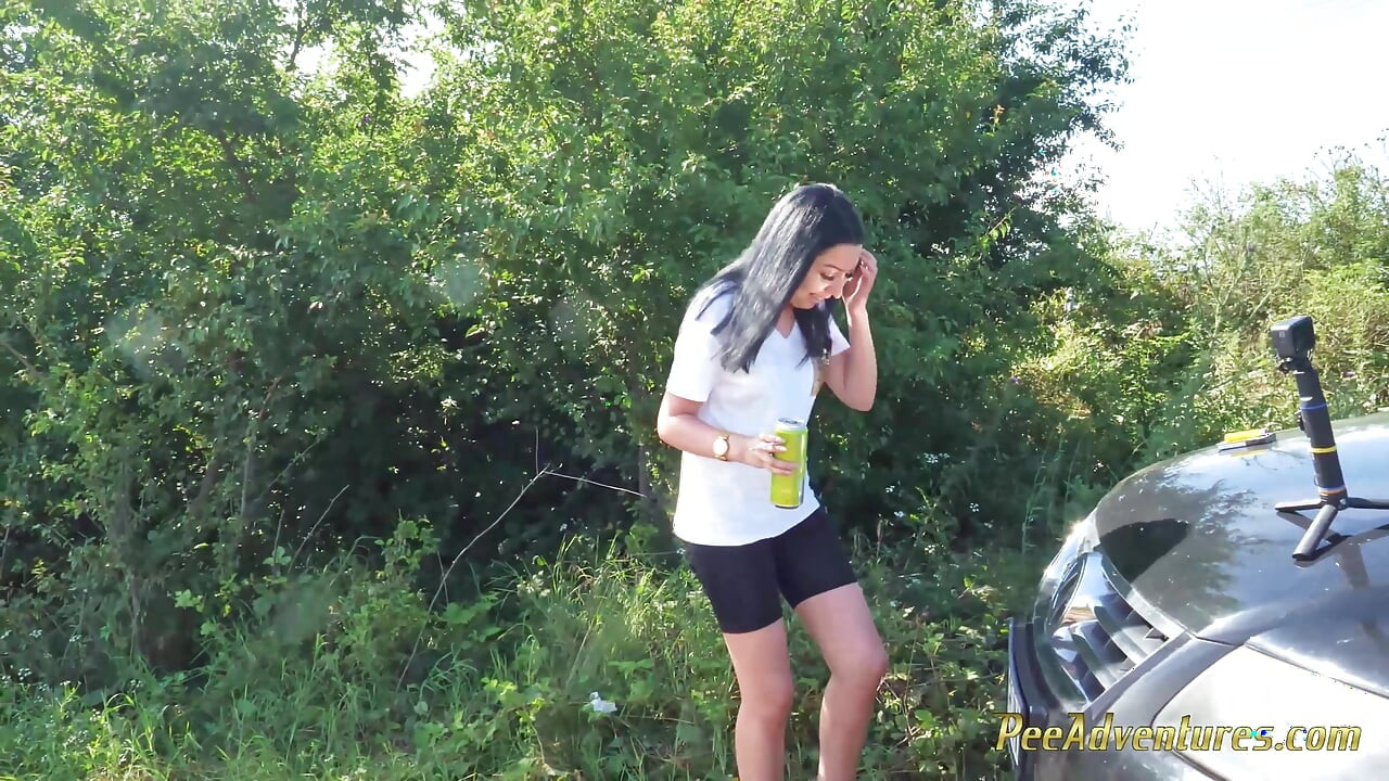 Sexy Brunette Trying Hard to Empty Her Bladder Outside, Then Quick Pee Next to a House in Construction