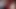 Mit Strapon, Latex Body und Maske masturbiert