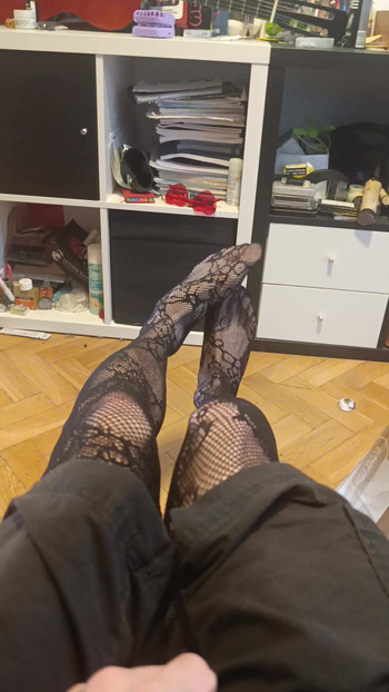 Cute feet in fishnets