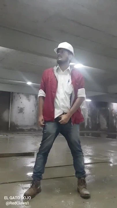 Construction worker showing his best tool