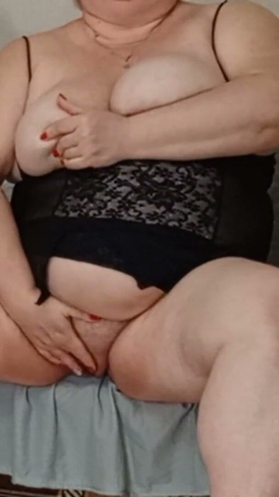 Mother-in-law plays with her tits and pussy with her hands | Clip 1