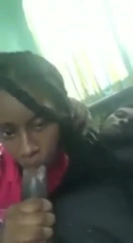 Ebony chick filling her mouth
