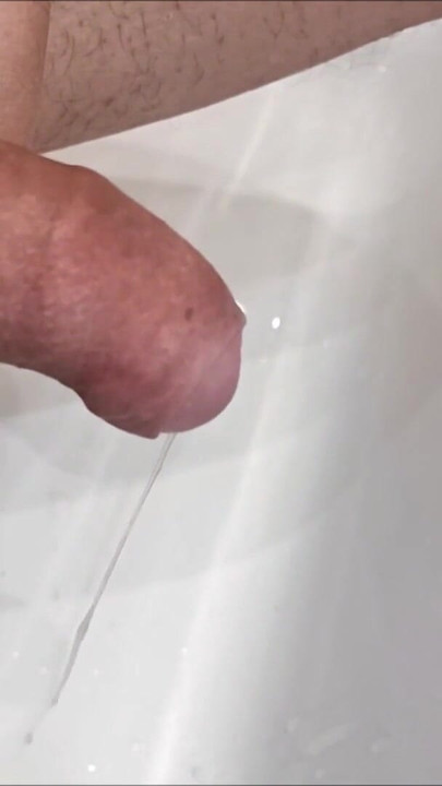 Must-share moment from "Slow motion flooding cumshot, cumming with a ball stretcher"